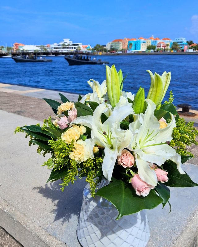 White lilies and roses on the Punda waterfront